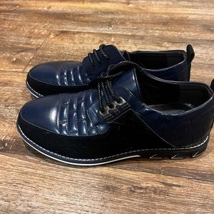 Dress shoe/sneaker. Never worn.